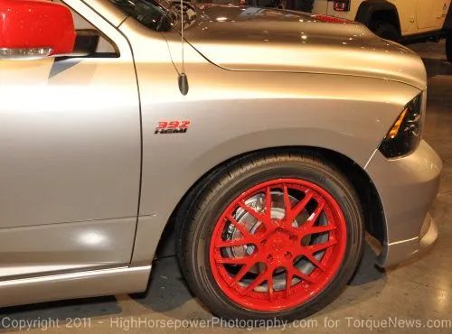 A close up look at the wheel, brakes and logo of the Ram 392