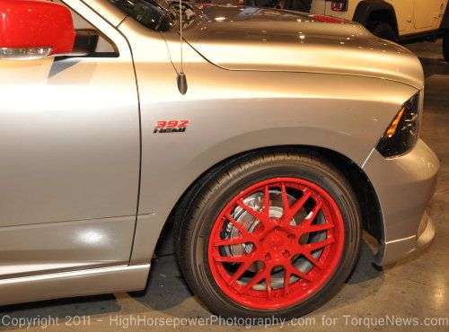 A close up look at the wheel, brakes and logo of the Ram 392