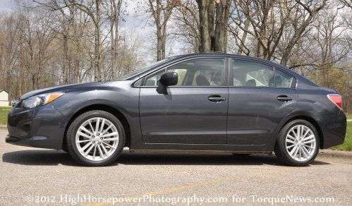 The side profile of the 2012 Subaru Impreza 20.i Premium sedan