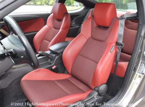 The bright red leath seats of the 2013 Hyundai Genesis Coupe 3.8 R-Spec