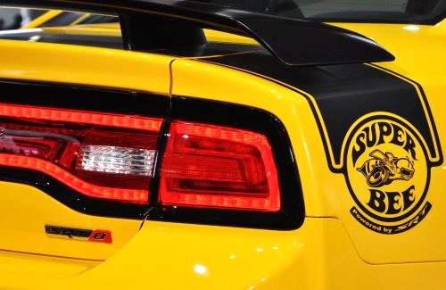 A close up look at the rear quarter panel badging of the 2012 Dodge Charger SRT8