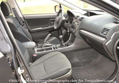 The front seating area of the 2012 Subaru Impreza 2.0i Premium sedan
