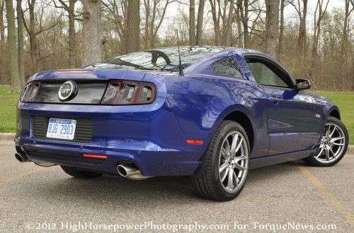 The 2013 Ford Mustang GT Premium Coupe from the rear