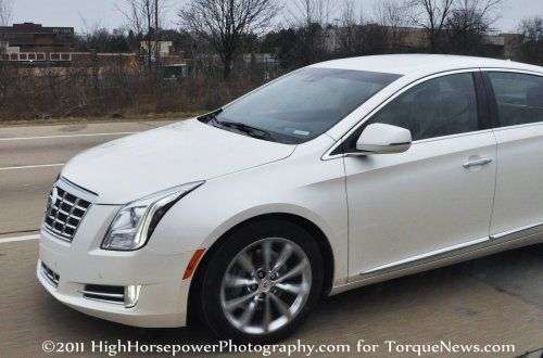 The close up shot of the Cadillac XTS4 sedan's front corner
