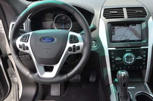 The dash and steering wheel of the 2011 Ford Explorer