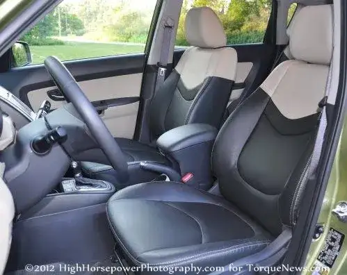 The front interior of the 2012 Kia Soul! with the Sand/Black leather