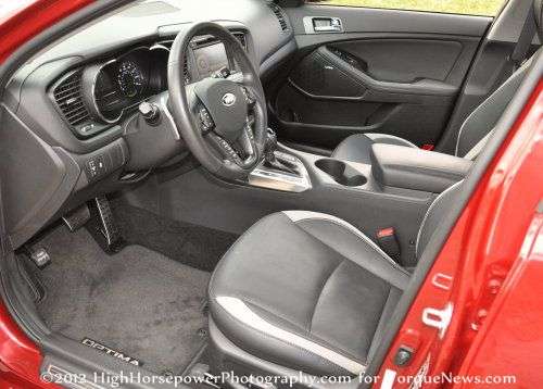 The front interior of the 2012 Kia Optima SX