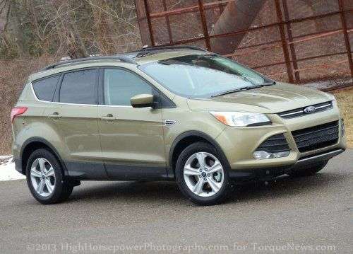 The side profile of the 2013 Ford Escape SE in Ginger Ale