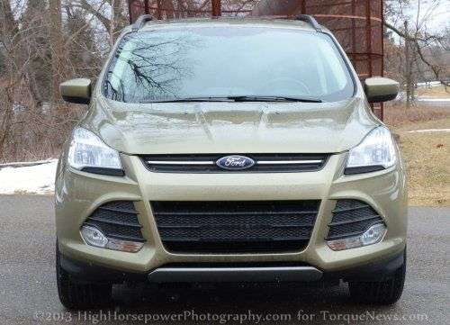 The front end of the 2013 Ford Escape SE in Ginger Ale