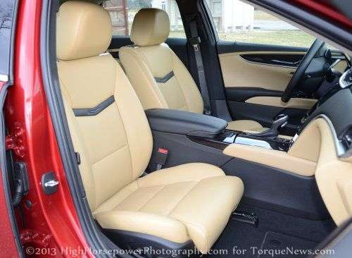 The front seats of the 2013 Cadillac XTS AWD Premium 