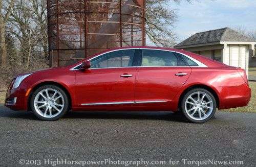 The side view of the 2013 Cadillac XTS AWD Premium 