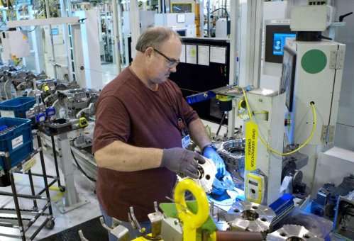 GM worker Michael Burrows builds a 6-speed transmission
