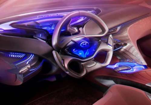 The dash and steering wheel of the new Hyundai i-oniq concept