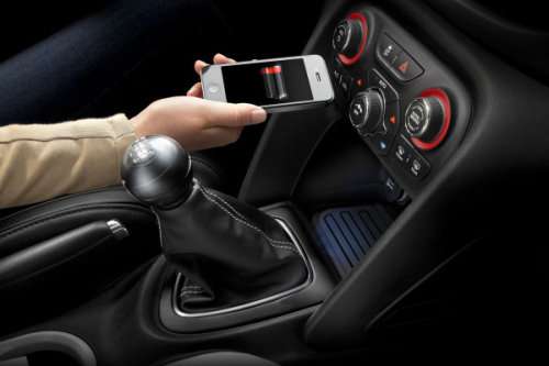 The 2013 Dodge Dart interior with the new charging pad.