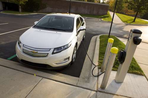 2012 Chevy Volt, charging, picture copyright GM
