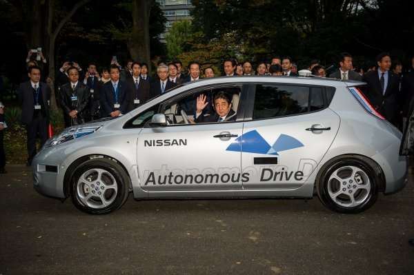 Japanese Prime Minister Shinzo Abe in Autonomous Drive Nissan LEAF
