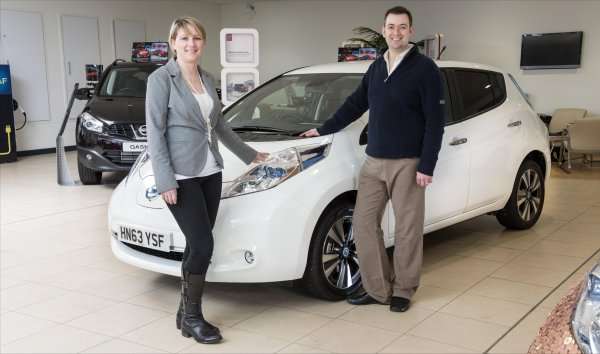 The Garners and their 100,000th Nissan LEAF