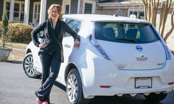 Amy Eichenberger and her new Nissan LEAF