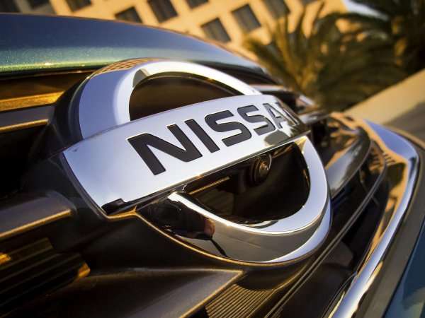 Nissan chrome nameplate