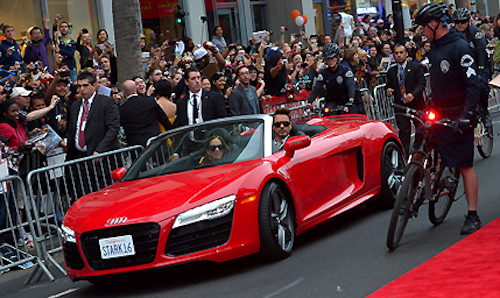 Robert Downey Jr. as Tony Stark, in Iron Man 3 driving 2014 Audi R8 e-tron