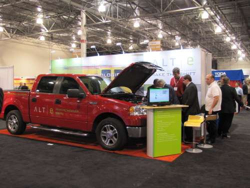 Booth of ALTe showing the retrofitted Ford F-150 at The Battery Show 2011