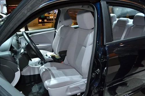 Driver-side open door of CODA Automotive EV at 2011 LA Auto Show