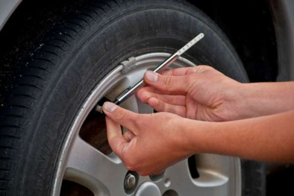You Can Easily Check Your Tire's Air Pressure With A Simple Air Gauge