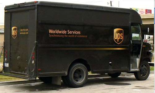 A United Parcel Service Van from the rear quarter. Location of image unknown. Im
