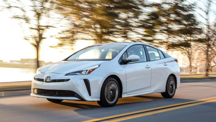 2020 Toyota Prius limited white driving full shot