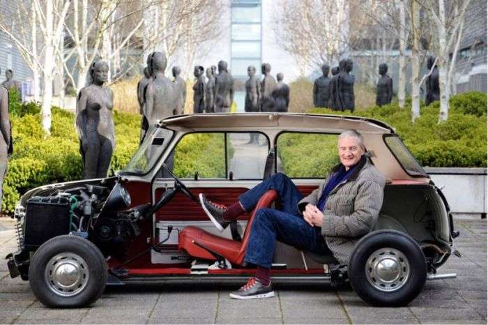 Dyson boss with Dyson electric car