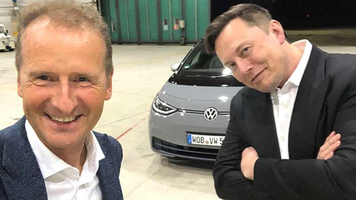 VW Chairman Herbert Diess and Tesla CEO Elon Musk after test-driving VW ID.3
