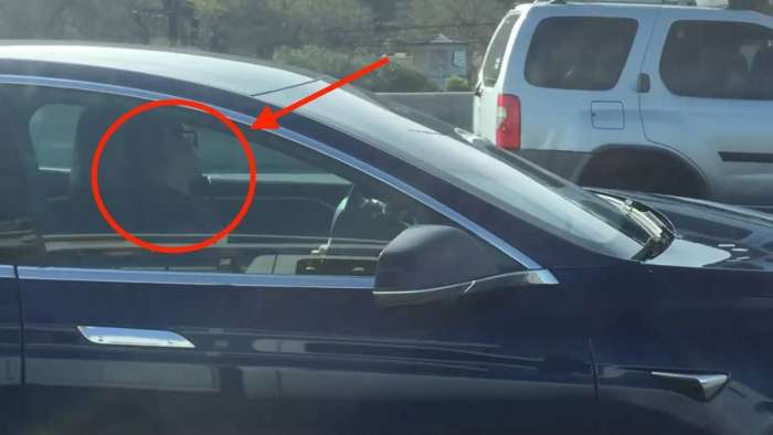 Driver sleeping behind Tesla Model s Autopilot