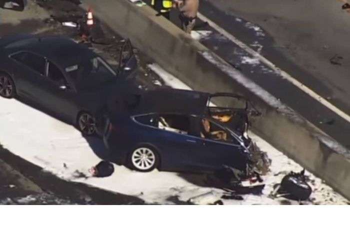 Tesla blames Model X autopilot death on driver and road.