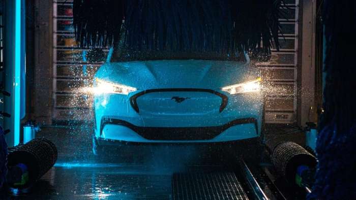 Image showing a Ford Mustang Mach-E electric SUV in a car wash
