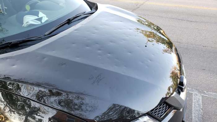 Car damaged by hail image by John Goreham