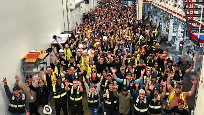 Tesla's 4680 battery cell production team after smashing a new record production