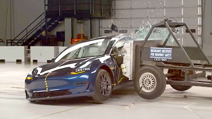 Tesla Battery designs undergo crash testing for improved safety.