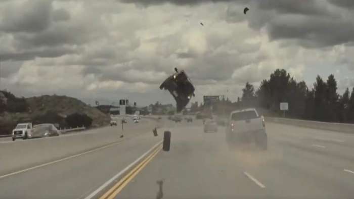 Tesla Camera Captures 1 In A Million Car Crash: Truck Tire Launches Kia 10 Feet In The Air