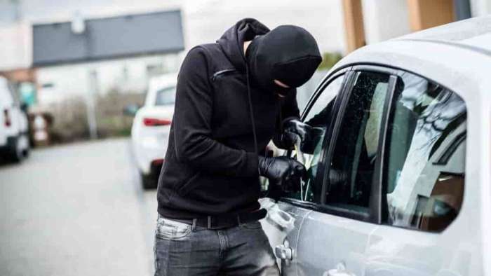 Car Thief Tries To Break Into Window