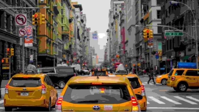 Toyota Prius taxi door open yellow new york
