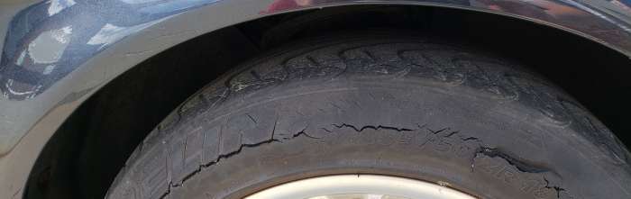 Tire image with cracks by John Goreham