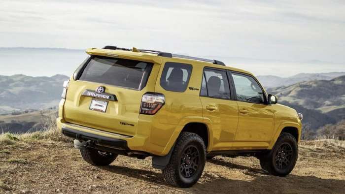 Toyota 4Runner TRD Pro Yellow back end rear end profile view
