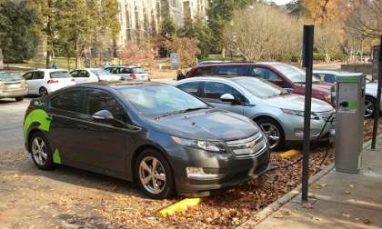 Two Chevy Volt cars being charged at GE station near Duke Chappel