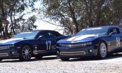 Two IBM color Chevrolet Camaros