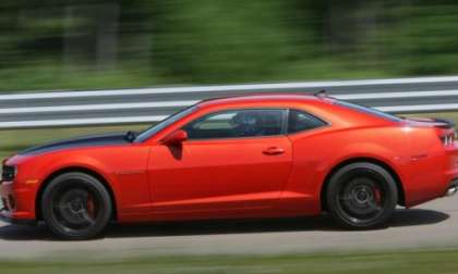 The side profile of the 2013 Chevrolet Camaro 1LE in red