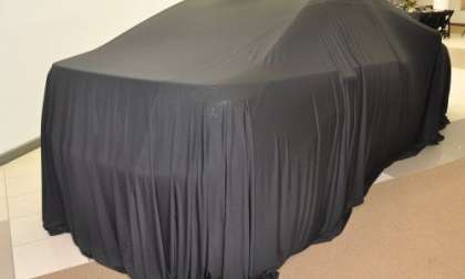 A mystery car under a cover