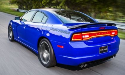 The rear end of the 2013 Dodge Charger Daytona with the tail lights lit