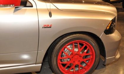 A close up look at the wheel, brakes and logo of the Ram 392