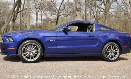 The 2013 Ford Mustang GT Premium Coupe from the side