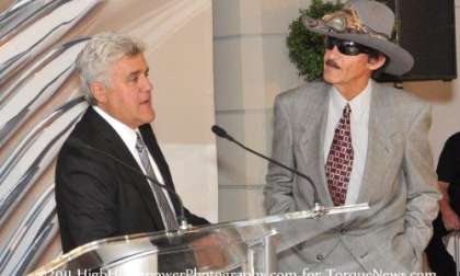 Jay Leno talks about the Volt while Richard Petty listens.